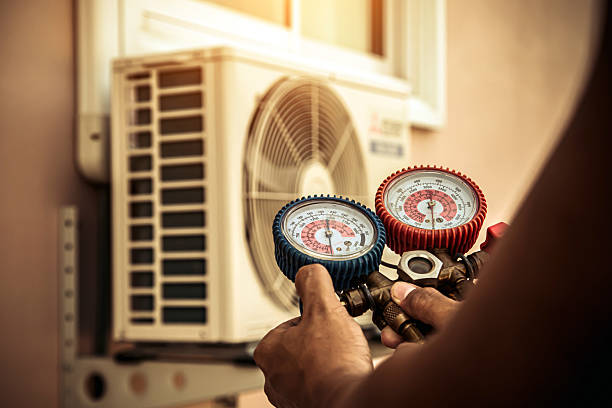 Professional Heat Pump Repair technician working in Lecanto, FL